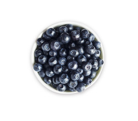 Top view. Bilberres in a bowl isolated on white. Ripe blaeberries with copy space for text. 