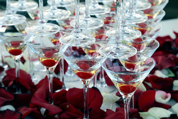 many of the champagne glasses stacked on top of each other