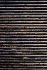 Oil Drill pipe. Rusty drill pipes were drilled in the well section. Downhole drilling rig. Laying the pipe on the deck. View of the shell of drill pipes laid in courtyard of the oil and gas warehouse.