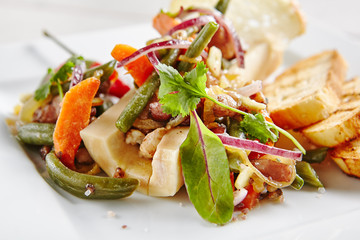 Baked Beef Bone Marrow with Vegetables on White Plate