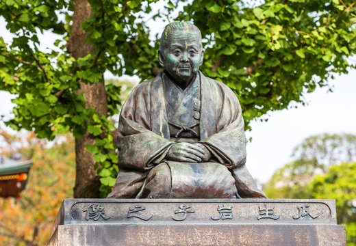 Statue in the city park, Tokyo, Japan.