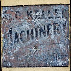 Old Painted Sign on a Wall