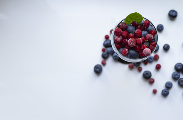  Wine glass with colorful berries.