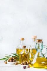 Fototapete Rund Assortment of fresh organic extra virgin olive oil in bottles © aamulya