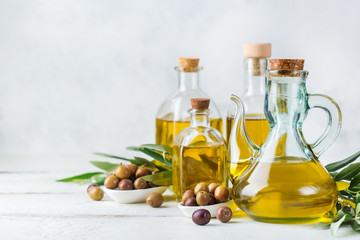 Assortment of fresh organic extra virgin olive oil in bottles