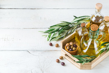 Assortment of fresh organic extra virgin olive oil in bottles