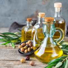 Assortment of fresh organic extra virgin olive oil in bottles