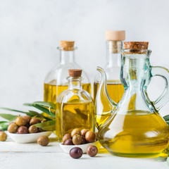 Assortment of fresh organic extra virgin olive oil in bottles