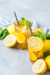 Lemon mint iced tea cocktail refreshing drink for summer days