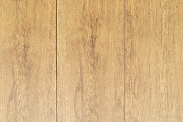 Naklejka premium Brown wooden background with vertical pattern