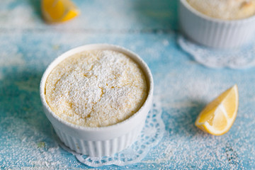 Homemade lemon puddings with lemon zest and juice