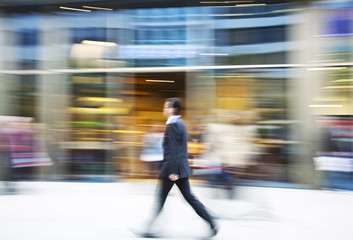 Man walking in the city, motion blur