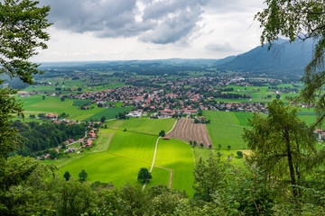 View on Grassau. Grassau is a market town in the district of Traunstein in Bavaria in Germany. It is located south of lake Chiemsee in the valley of the Tiroler Ache.