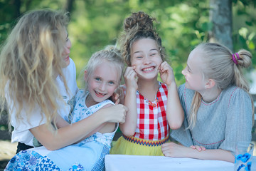 girlfriends funny children playing in the summer / group of girls having fun on a summer day, girlfriends children, summer vacation