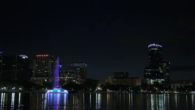 Lake Eola and buildings at night