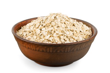 the oat flakes on a wooden spoon