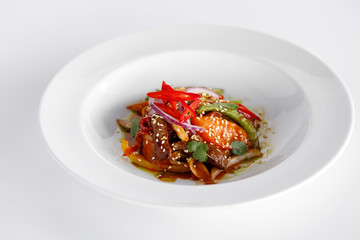Warm salad with meat and vegetables