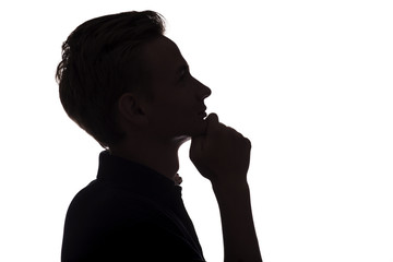 silhouette portrait of thoughtful guy, man face profile on a white isolated background