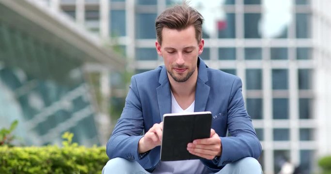 Caucasian Businessman use of tablet computer