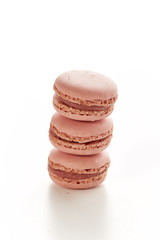 tower of three strawberry flavored macaroons