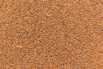 Background of coffee color from ground and dried coffee