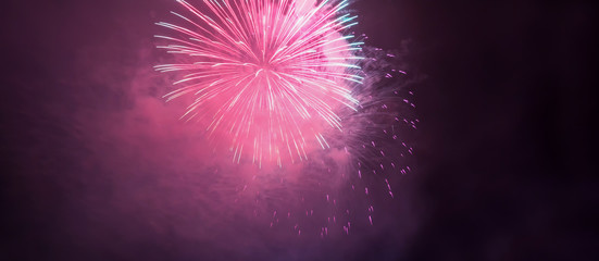 horizontal banner with pink fireworks