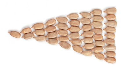 peeled sunflower seeds on white background