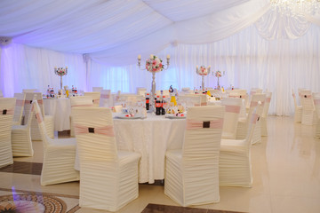 The banquet hall with round tables