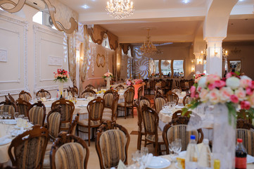 The banquet hall with round tables