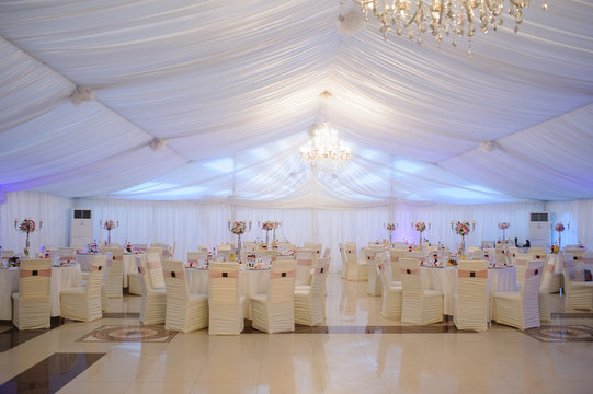 The Banquet Hall With Round Tables