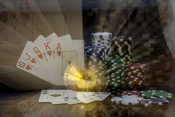 golden Bitcoin in front of a royal flush in hearts and gambling chips in the front a royal flush in spread and more gambling chips, zoomed