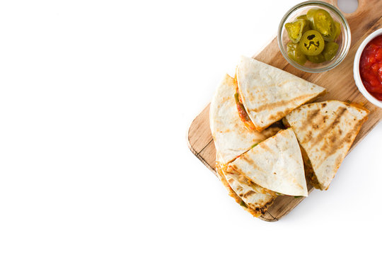Mexican quesadilla with chicken, cheese and peppers, isolated on white background. Top view. Copyspace
