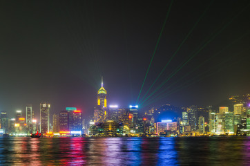 Hong Kong city skyline with light show and reflection, from Kowloon