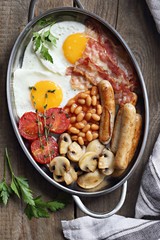 Traditional Full English Breakfast. Rustic style photography. Overhead 