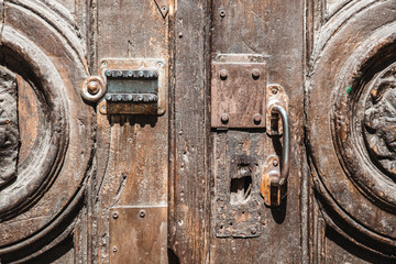 old vintage wooden doors close up with lock