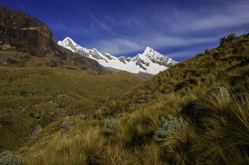 Amazing landscape around Alpamayo, one of highest mountain peaks in Peruvian Andes, Cordillera Blanca