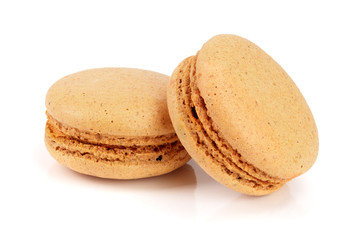 orange macaroon isolated on white background closeup
