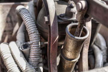 Details of an old fire extinguisher machine on a court in Csernat, Transylvania, Romania