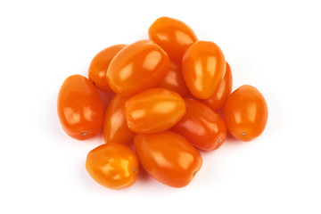 Ripe fresh orange cherry tomatoes, isolated on white background. Close-up.