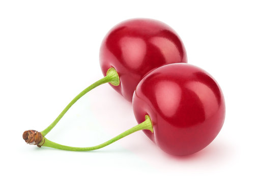 Two fresh cherries berries isolated on the white background with clipping path. One of the best isolated cherries that you have seen.