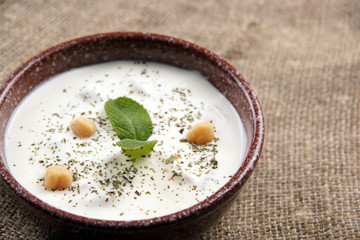 Chickpea soup with mint on the table