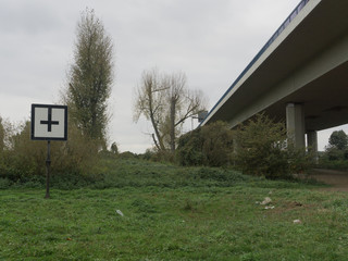 The modern European highway among green thickets