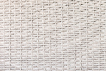Light beige surface of woven bamboo. Background image, texture.