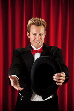 Magician: Showing Empty Hat to Audience