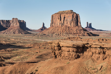 Fototapeta premium Monument valley buttes Panoramic grand view of the buttes and mesas found in the Monument Valley in Utah and Arizona, USA