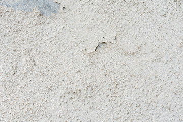 Wall fragment with scratches and cracks