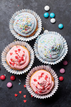 Sweet cupcakes with colorful decor