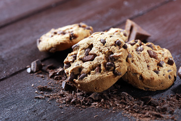 Chocolate cookies on table. Chocolate chip cookies shot with chocolate