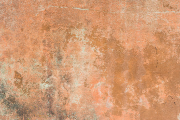 Wall fragment with scratches and cracks