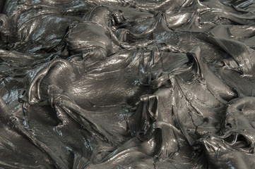 Black lubricating grease Close-up shot of special lubrication for automotive uses